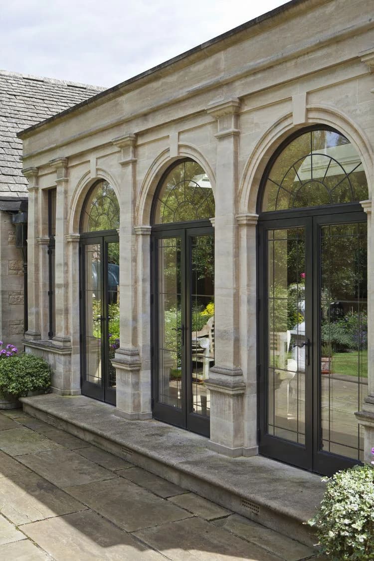 Luxury stone facade with arched windows built by Katsaros Build, Melbourne